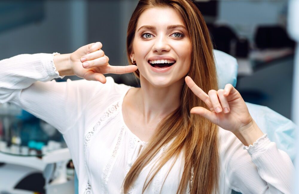 Young,Woman,At,The,Dentist's,Chair,During,A,Dental,Procedure.
